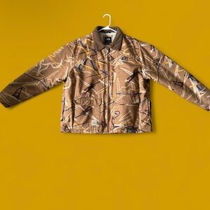 Zara Tan and Brown Patterned Fabric Label